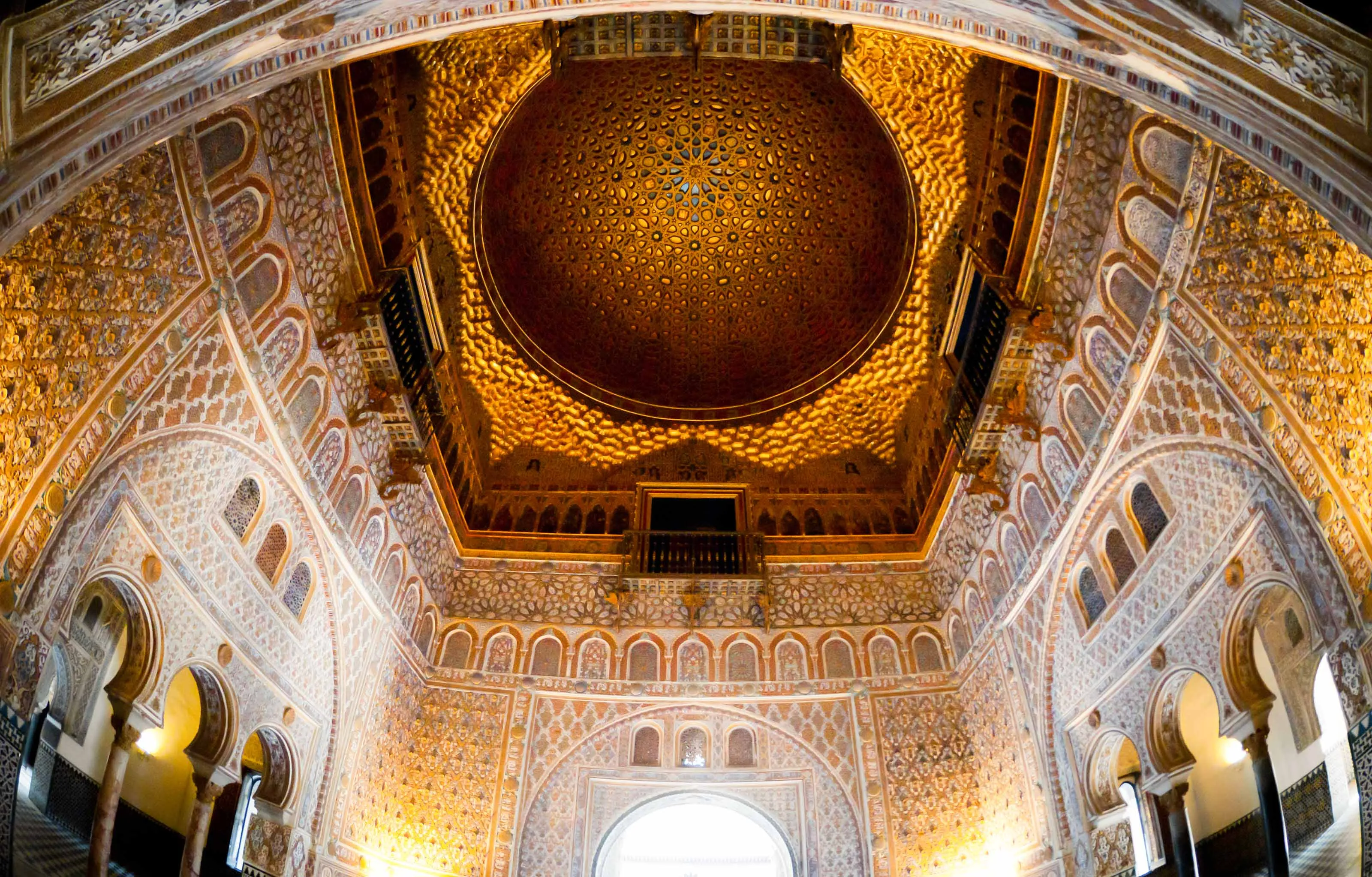 Intricate artesonado wooden ceiling of the Hall of Ambassadors in the Alcázar