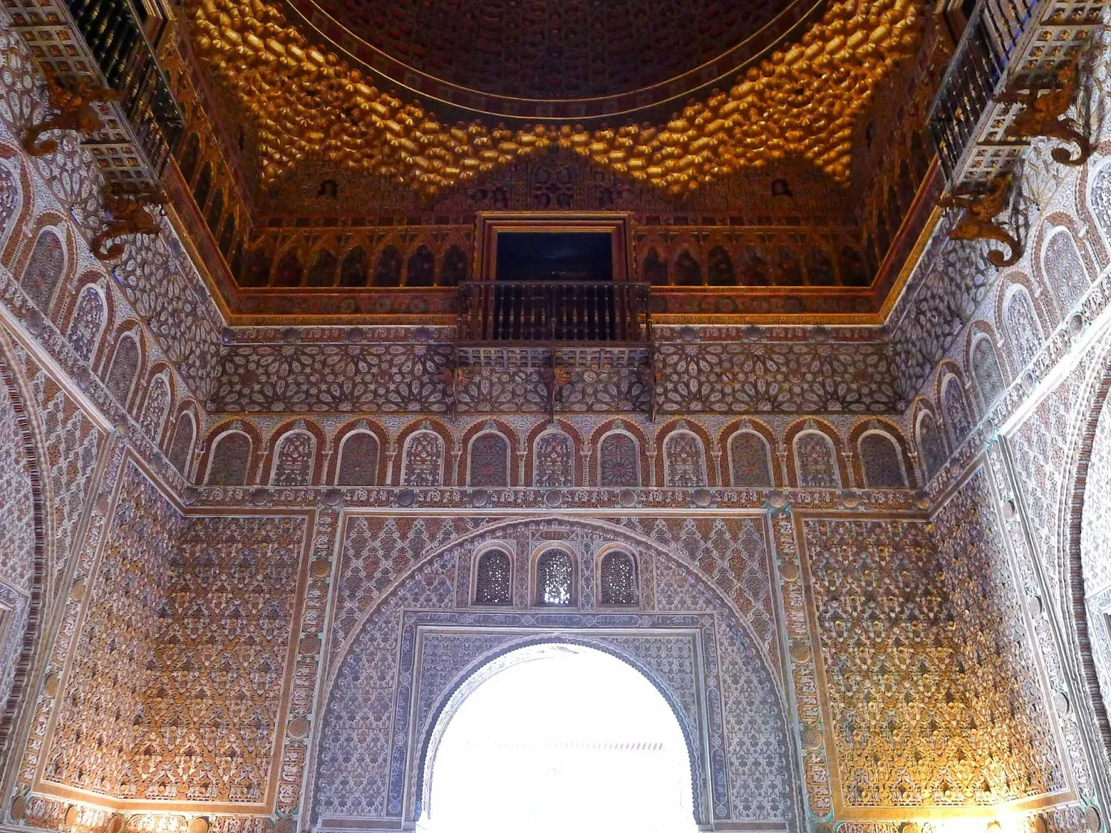 Elaborate Mudéjar entrance archway leading into the Hall of Ambassadors